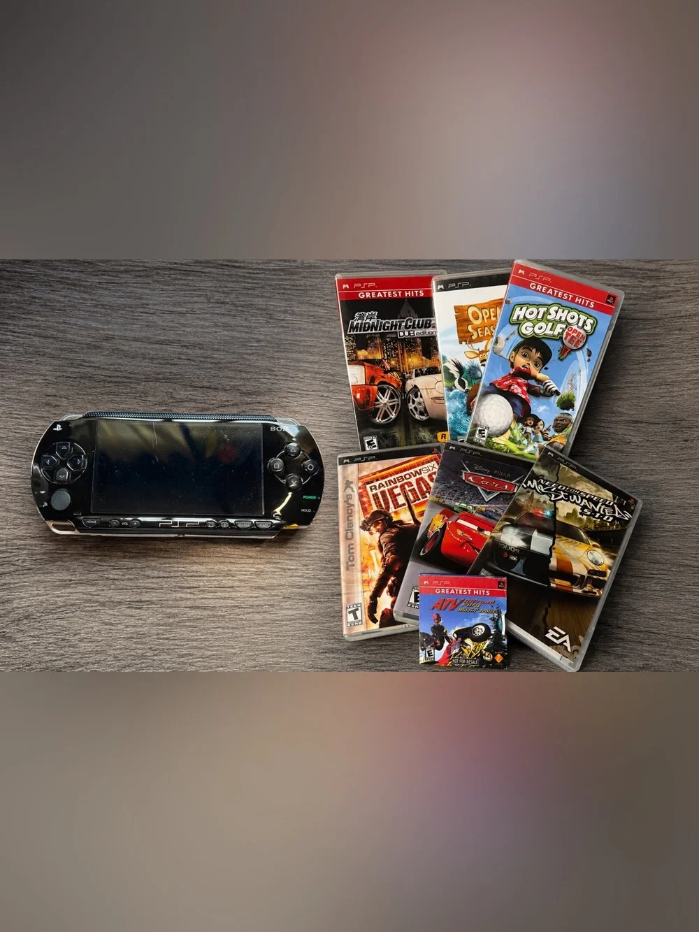 Sony PSP Handheld System With Charger, 8GB Memory Card And 7 Games